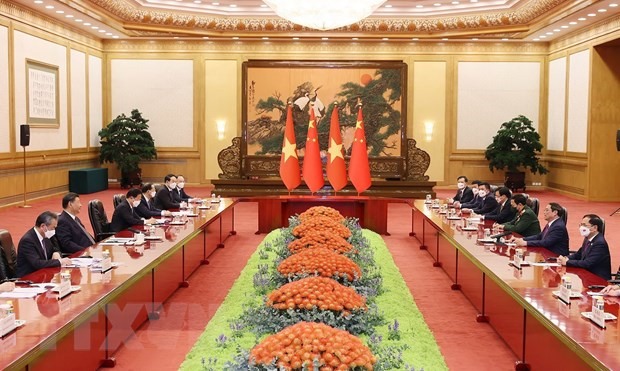 Thủ tướng Chính phủ Phạm Minh Chính hội kiến Tổng Bí thư, Chủ tịch Trung Quốc Tập Cận Bình. Ảnh: TTXVN