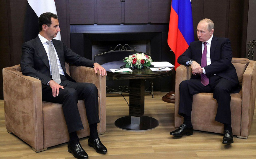 Hai nhà lãnh đạo Nga - Syria gặp gỡ tại Sochi. Ảnh: Twitter
