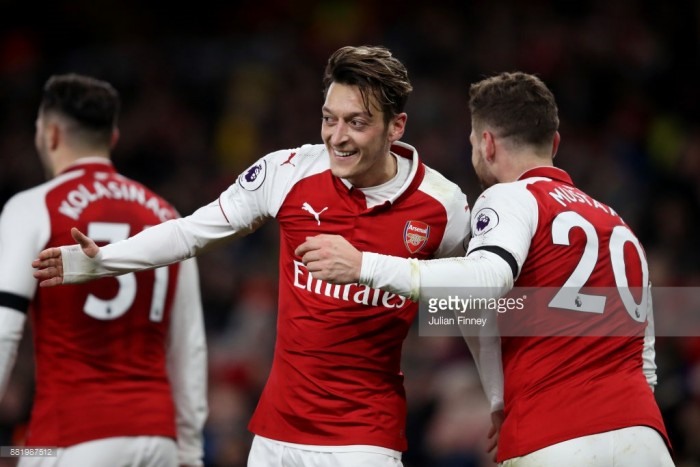 Ozil trở lại và lĩnh xướng hàng tiền vệ Arsenal. Ảnh: Getty.