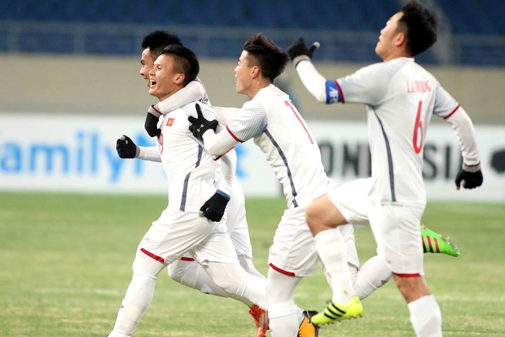 Trong trận đấu với U23 Qatar, U23 Việt Nam mặc áo trắng. Ảnh: Hữu Phạm