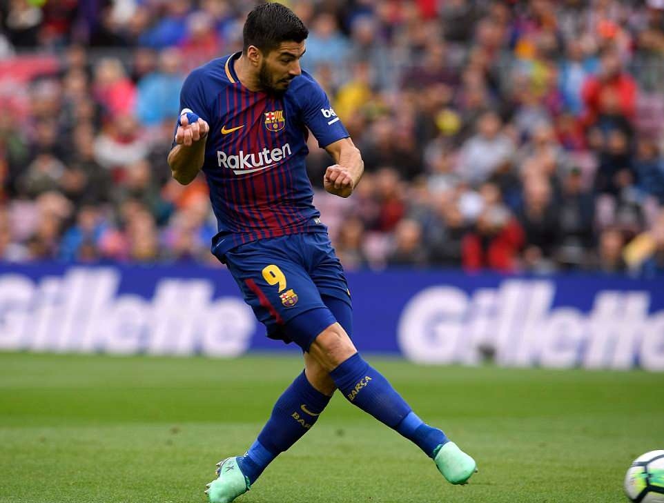 Pha ghi bàn mở tỷ số của Luis Suarez. Ảnh: Getty Images.