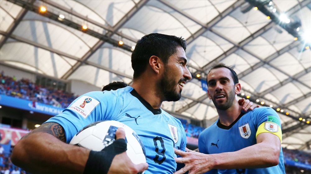 Uruguay của Suarez là đội bóng tiếp theo của bảng A vào vòng 1/8 chỉ sau 2 lượt trận toàn thắng. Ảnh: FIFA