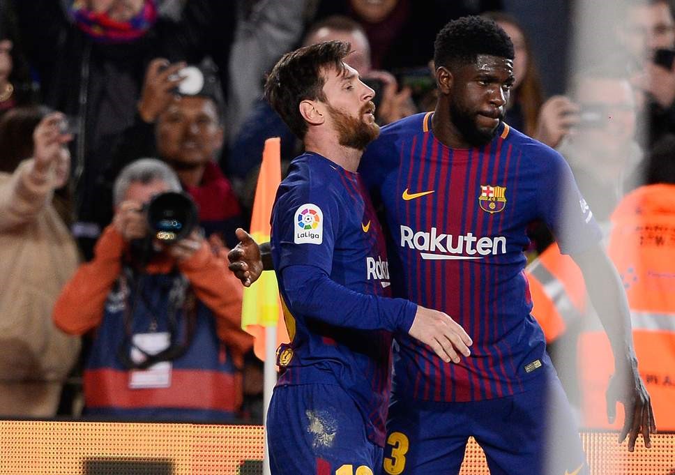 Messi (trái) và Umtiti (phải) khi thi đấu trong màu áo Barcelona. Ảnh: Getty Images.