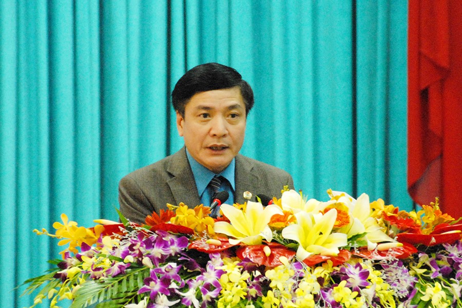Chủ tịch Tổng LĐLĐVN Bùi Văn Cường trình bày tham luận tại hội thảo. Ảnh: PV