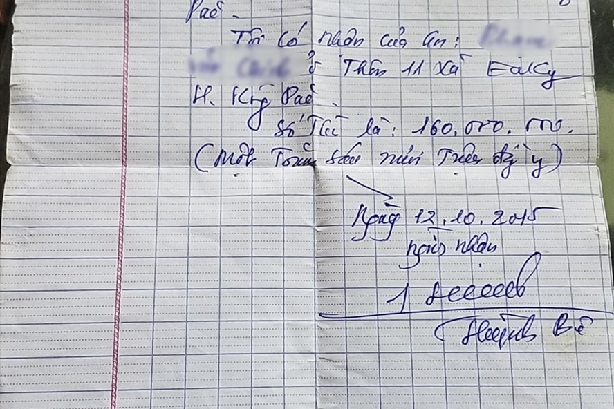 Một giấy viết tay của ông Huỳnh Bê với nội dung “mượn tiền”