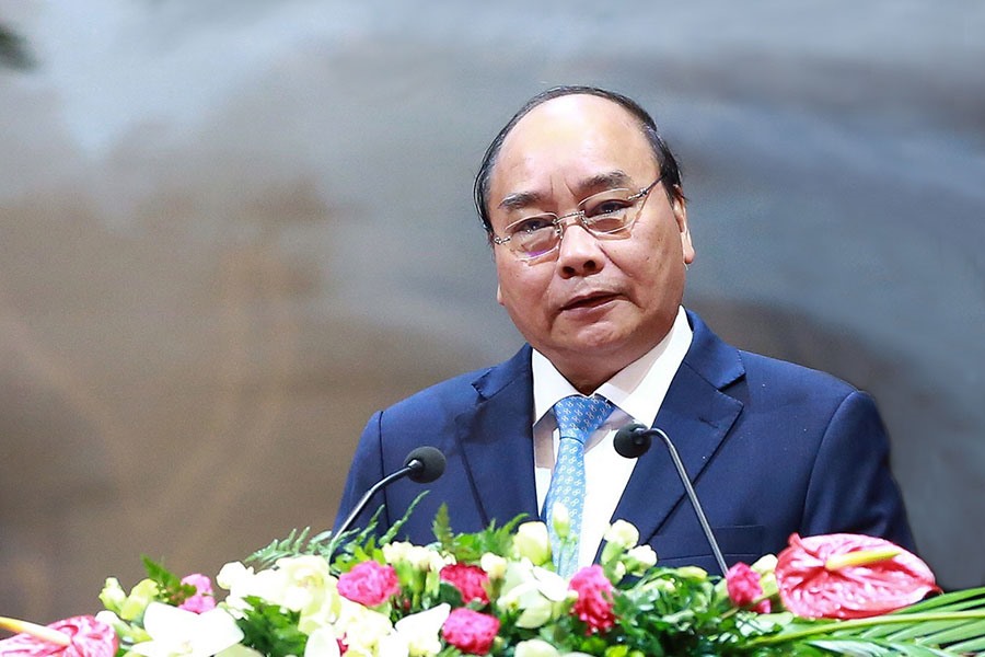 Thủ tướng Chính phủ Nguyễn Xuân Phúc đối thoại với các đại biểu tại Đại hội XII Công đoàn Việt Nam. Ảnh: HẢI NGUYỄN