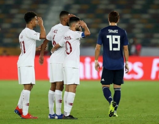 Các mà các cầu thủ Qatar ăn mừng.