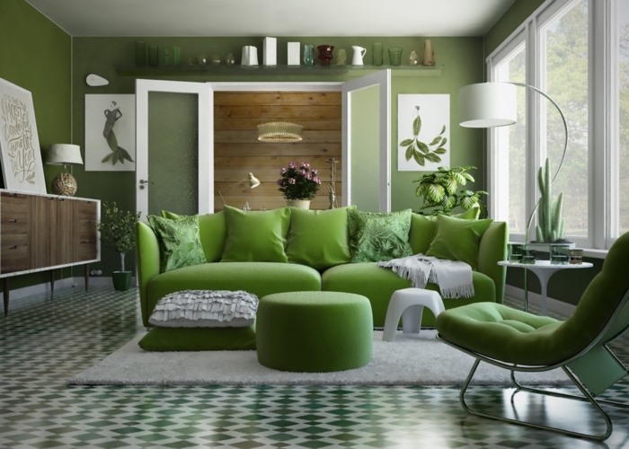 Bộ bàn ghế sofa màu xanh lá cây tạo nên không gian mát mẻ cho căn phòng.  