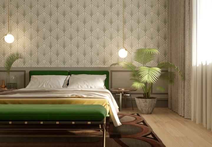 Vải bọc giường ngủ màu xanh lá hài hòa với màu sắc của chậu cây bên cạnh.  