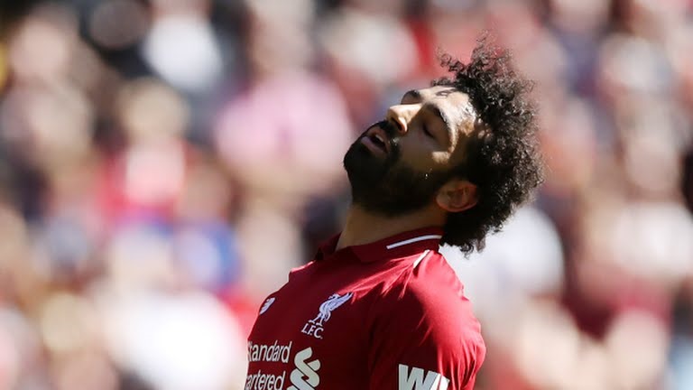 Chiến thắng 2-0 trước Wolves là không đủ giúp Salah và các đồng đội lên ngôi vô địch. Ảnh: Reuters.
