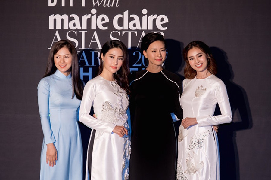 Ninh Dương Lan Ngọc (bìa phải) và dàn diễn viên “Cô Ba Sài Gòn” diện áo dài trong đêm trao giải.