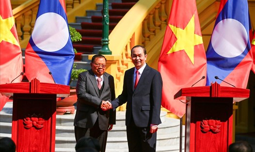 Chủ tịch Nước Trần Đại Quang và Tổng Bí thư, Chủ tịch Nước Lào tại họp báo trưa 20.12. Ảnh: Sơn Tùng