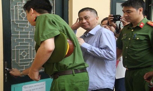 Ninh Văn Quỳnh tại một lần được dẫn ra tòa. 
