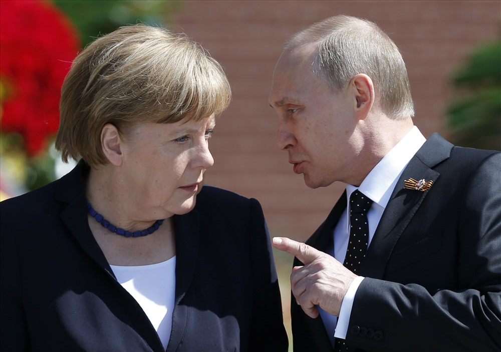Tổng thống Vladimir Putin và Thủ tướng Angela Merkel. Ảnh: Reuters