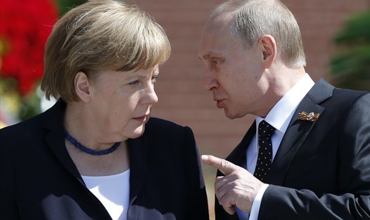 Tổng thống Vladimir Putin và Thủ tướng Angela Merkel. Ảnh: Reuters