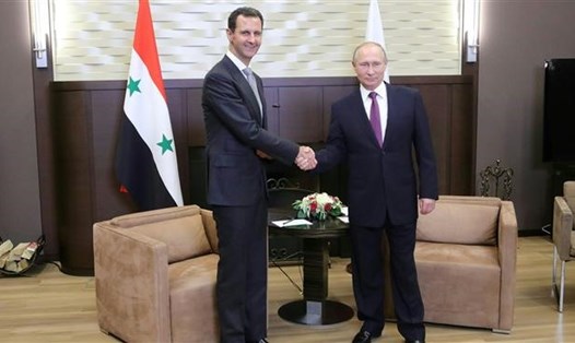 Tổng thống Vladimir Putin và Tổng thống Syria Bashar al-Assad. Ảnh: AFP