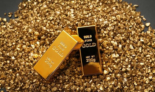 Dự báo giá vàng sẽ nhanh chóng cán mốc 1.300 USD/ounce. Ảnh PV