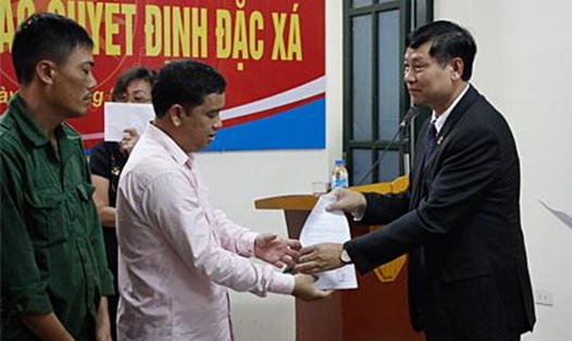 Chánh án Nguyễn Hữu Chính (phải ảnh). Ảnh: Cổng thông tin TAND Tối cao