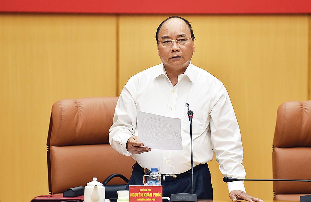 Thủ tướng Nguyễn Xuân Phúc phát biểu tại hội nghị - Ảnh: VGP/Nhật Bắc