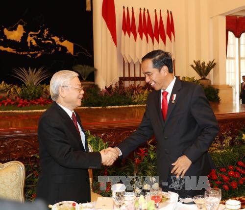 Tổng Bí thư Nguyễn Phú Trọng dự chiêu đãi chính thức của Tổng thống Indonesia Joko Widodo trong chuyến thăm chính thức Cộng hòa Indonesia. Ảnh: Trí Dũng/TTXVN