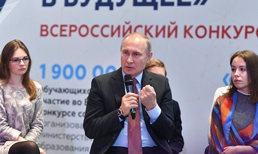 Tổng thống Nga Vladimir Putin trong cuộc gặp báo giới. Ảnh: Sputnik