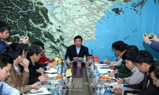 Tổng cục trưởng Tổng cục Phòng chống thiên tai - Ủy viên thường trực BCĐ Trung ương về PCTT Trần Quang Hoài báo cáo về diễn biến của cơn bão số 1. Ảnh: Vũ Sinh – TTXVN