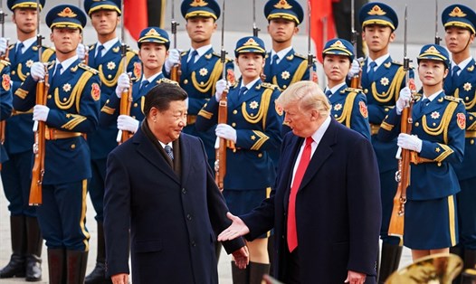 Chủ tịch Tập Cận Bình đón Tổng thống Donald Trump thăm Trung Quốc tháng 11.2017. Ảnh: TNS