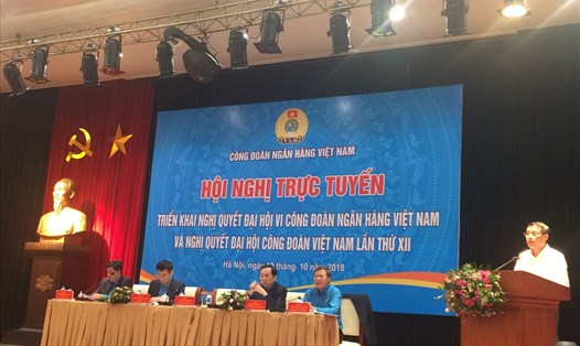 Đồng chí Lê Minh Hưng, Ủy viên TƯ Đảng, Thống đốc Ngân hàng Nhà nước Việt Nam phát biểu tại Hội nghị. 