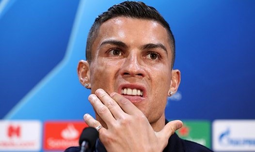 Cristiano Ronaldo tham dự buổi họp báo trước trận đấu giữa Man United và Juventus. Ảnh: PA.