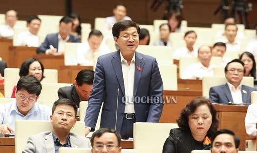 Tổng Thanh tra Chính phủ Lê Minh Khái trả lời chất vấn tại Quốc hội chiều 31.10. Ảnh: Quochoi.vn