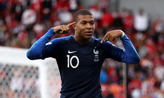 Mbappe thi đấu nổi bật ở cả ĐT Pháp lẫn PSG trong năm 2018. Ảnh: Getty Images.