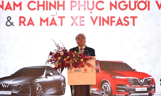 Thủ tướng Nguyễn Xuân Phúc phát biểu trong lễ phát động phong trào “Hàng Việt Nam chinh phục người Việt Nam”. Ảnh Hoàng Anh