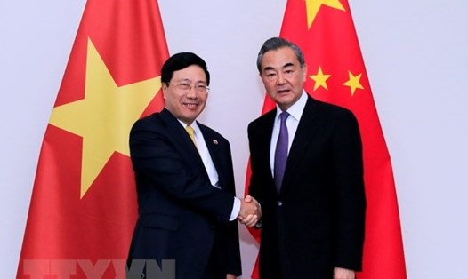 Phó Thủ tướng, Bộ trưởng Ngoại giao Phạm Bình Minh gặp Ủy viên Quốc vụ, Bộ trưởng Ngoại giao Trung Quốc Vương Nghị. Ảnh: TTXVN