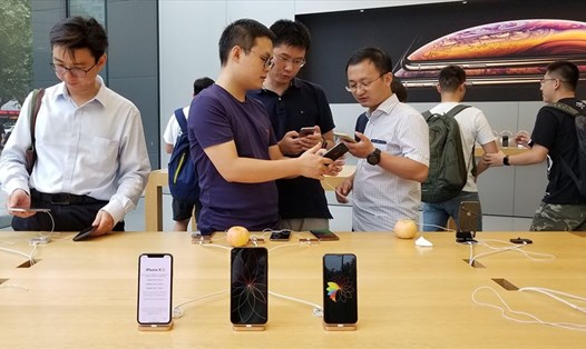 Nhiều công ty Trung Quốc doạ sa thải nhân viên sử dụng iPhone. Ảnh: 9to5mac