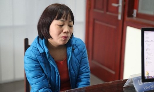 Nữ phóng viên Đào Thị Thanh Bình (báo Thương hiệu và Công luận) tại cơ quan công an. Ảnh: Thuý Phương