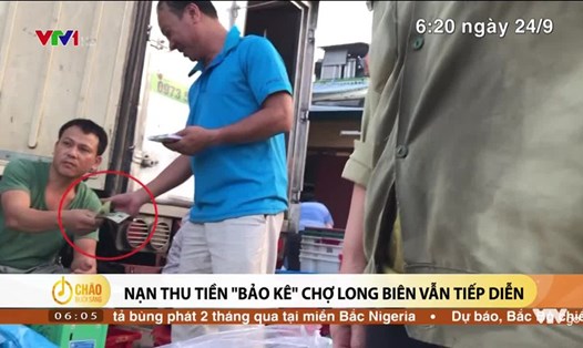Tình trạng bảo kê ở chợ Long Biên. 
