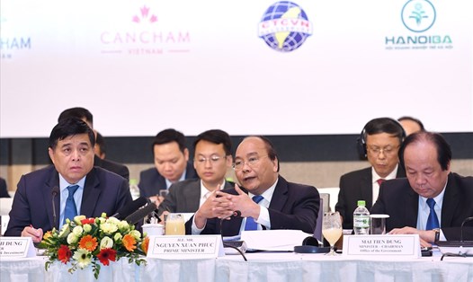 Thủ tướng dự và phát biểu tại Diễn đàn Doanh nghiệp 2018. Ảnh: VGP/Quang Hiếu