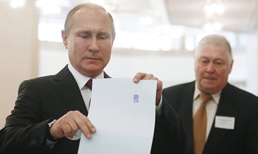 Tổng thống Vladimir Putin tái đắc cử trong cuộc bỏ phiếu ngày 18.3. Ảnh: Sputnik
