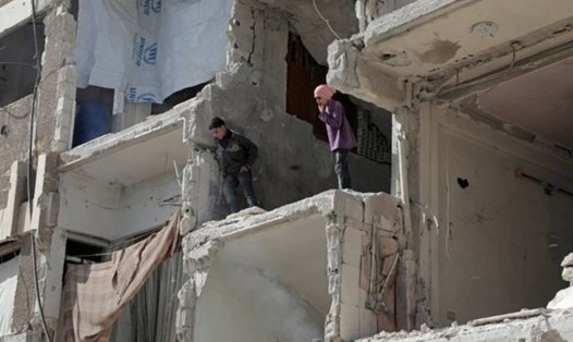 Liên Hợp Quốc cho biết còn khoảng 80.000 dân thường vẫn bị mắc kẹt ở Douma. Ảnh: AFP