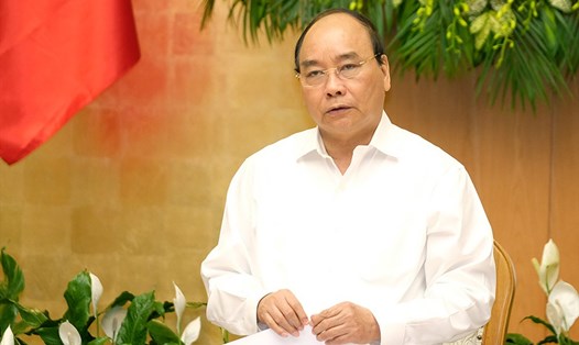 Thủ tướng Nguyễn Xuân Phúc chủ trì phiên họp thường kỳ Chính phủ tháng 3.2018. Ảnh: VGP