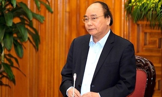 Thủ tướng Nguyễn Xuân Phúc chỉ đạo Bộ GD-ĐT nhanh chóng trình quy định mới về tiêu chuẩn, quy trình công nhận GS.PGS. Ảnh: VGP