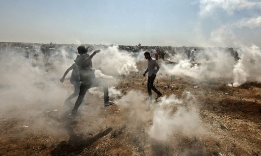Ít nhất 129 người Palestine bị Israel bắn chết trong các cuộc biểu tình gần biên giới với Gaza kể từ cuối tháng 3. Không người Israel nào thiệt mạng. Ảnh: AFP. 