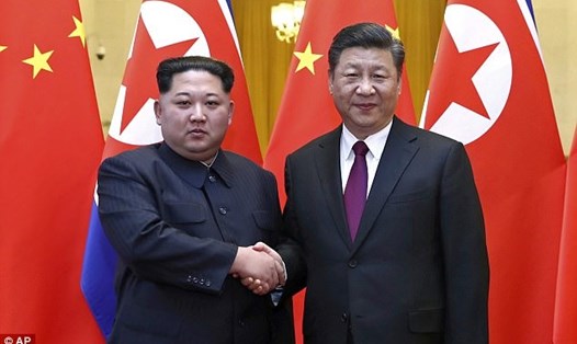 Ông Kim Jong-un và ông Tập Cận Bình. Ảnh: AP. 