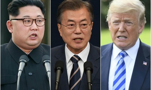 Một quan chức Hàn Quốc cho biết, chưa có quyết định nào được đưa ra về việc liệu Tổng thống Moon Jae In (giữa) có tham dự thượng đỉnh giữa ông Kim Jong-un (trái) và ông Donald Trump tại Singapore ngày 12.6 không. Ảnh: AFP.
