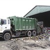 Hàng chục tấn rác thải được tập kết hàng ngày tại bô rác tạm phường Hiệp Thành (quận 12). Ảnh: CHÂM BÙI