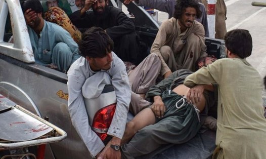 Các nạn nhân trong vụ đánh bom ở Pakistan hôm 13.7. Ảnh: AFP. 