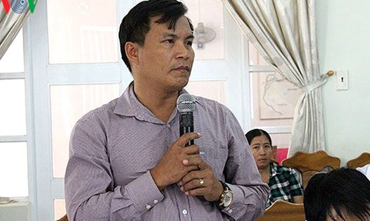Ông Nguyễn Thanh Nam phát biểu giải trình tại một cuộc họp của huyện Vạn Ninh.