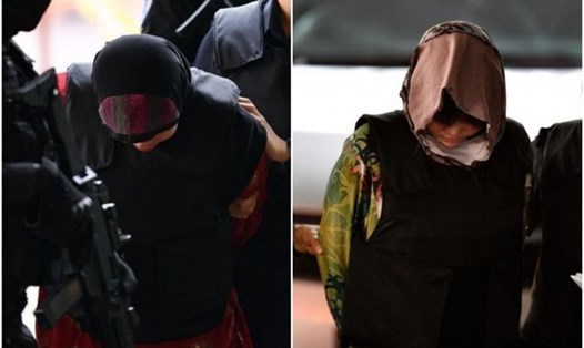 Đoàn Thị Hương (phải) và bị cáo người Indonesia. Ảnh: AFP.