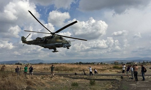 Trực thăng tấn công Mi-24 tại căn cứ không quân Hmeimim của Nga ở Syria. Ảnh: Sputnik
