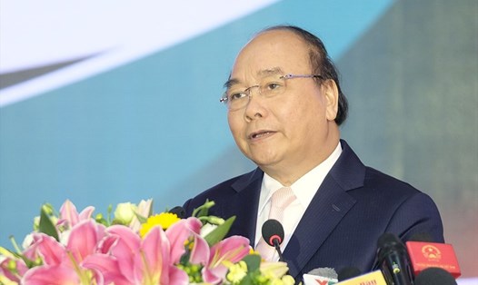 Thủ tướng Nguyễn Xuân Phúc phát biểu tại Hội nghị xúc tiến đầu tư và trao giấy chứng nhận đăng ký đầu tư cho các nhà đầu tư trong và ngoài nước của tỉnh Bình Phước ngày 20.8. Ảnh: VGP